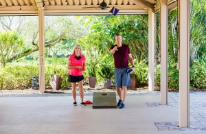 Couple plays cornhole at the best hotel on Sanibel Island