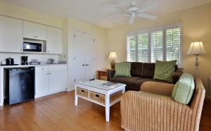 Sanibel Inn guest room seating area and kitchenette