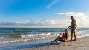 The beautiful Florida beaches at Seaside Inn, enjoyed by a relaxing couple