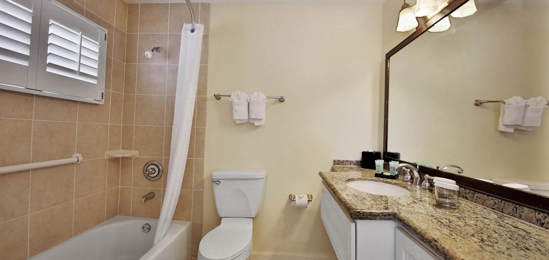 Sanibel Seaside Inn bathroom, bath, shower, and amenities