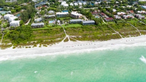 Aerial view of the beach with emerald green waters